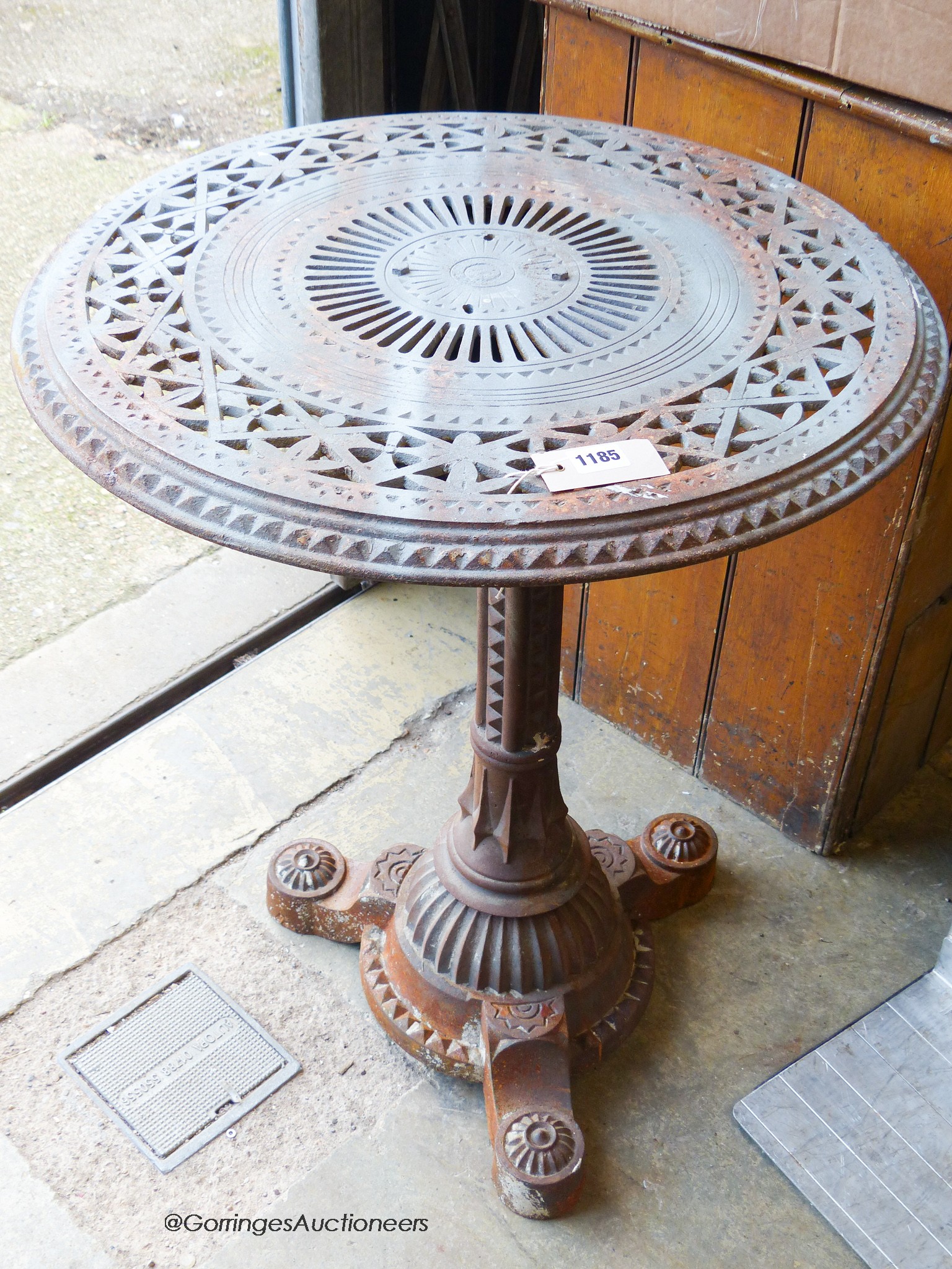 A Victorian Aesthetic movement cast iron circular garden table in the manner of Christopher Dresser, diameter 61cm, height 75cm